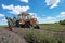 Tractor harvesting field.