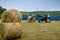 Tractor hay stacks in the field
