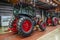 Tractor industry manufacture. New tractors on factory line. Production of agricultural machinery