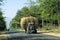 Tractor loaded with straw bundles