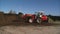 Tractor loader  carrying farm manure
