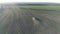 Tractor makes fertilizer. Aerial survey