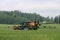 Tractor and Mounted Sprayer on Wheat Field