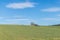 Tractor mows a meadow in the Bavarian Forest, Germany