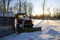 Tractor in the parking lot covered with snow