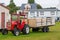 Tractor with a passenger wagon in village of Hrisey in Iceland