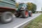 Tractor passing by on a national highway, Germany