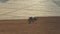 Tractor Planting Seeds Of Corn Crops In Agrarian Field At Sunset Aerial View