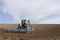 Tractor ploughing field