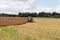 Tractor plow autumn field stork