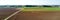 Tractor plowing the fields, aerial view, plowing, sowing, harvest. Agriculture and Farming, campaign