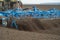 Tractor preparing land with seedbed cultivator as part of pre se