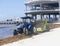 Tractor removes seaweed from beach in Mexico