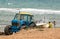 Tractor retrieving a boat from the splashing water