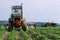 Tractor riding through field