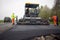 Tractor, roller on the road repair site. Road construction equipment. Road repair concept.