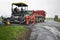 Tractor, roller on the road repair site. Road construction equipment. Road repair concept.