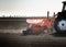 Tractor and seeder for sowing corn