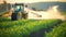 A tractor is seen driving through a lush green field under a clear blue sky, Tractor spraying pesticides fertilizer on soybean