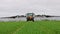 Tractor with a slurry spreader Dribble Bar in a field. UK