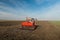 Tractor sowing seeds and field