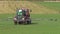 Tractor spray autumn season green crop field