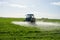 Tractor spray fertilize field pesticide chemical