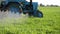 Tractor spray herbicide
