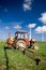 Tractor spraying green field