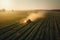 A tractor sprays chemicals to control pests and weeds in crops, ensuring healthier and more abundant harvests