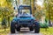 a tractor standing in front of the nature