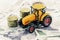 A tractor toy on banknotes as a concept of buying or renting a tractor