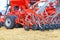 Tractor trailed agricultural unit multi-row disc harrow with a mechanism for uniform distribution of fertilizers in the soil