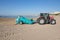 Tractor with trailer cleaning beach in Benicassim