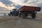 Tractor with a trailer delivering mined salt from a salt lake