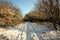 tractor tyre tracks in the snow.