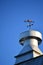 Tractor weathervane on top of barn vent
