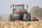 Tractor working on a corn field in czech republic