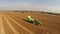 Tractor works on the field