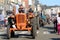 Tractors driving through the main street in ErnÃ©e, Mayenne, France at the Foire st Gregoire 2018