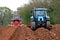 Tractors ploughing