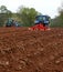 Tractors ploughing