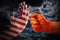 Trade conflict, USA flag on a stop hand and China flag on a fist