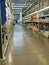 Trade shelves and racks Warehouse of household and grocery goods. Sales floor without visible trademarks.