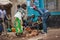 trade on the street Congolese people sitting on the ground selling chicken