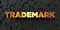 Trademark - Gold text on black background - 3D rendered royalty free stock picture