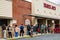 Trader Joe workers monitor buyers at entrance