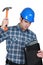 Tradesman hitting his laptop