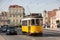 Tradidional yellow Tram in Belem street. Lisbon. Portugal