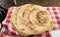 Tradition arabic flatbread other names is pita, lavash, lafa, parantha, chapati